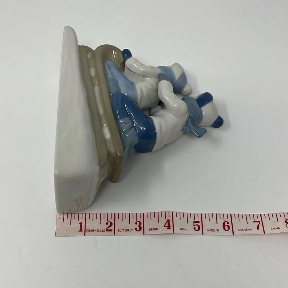 Porcelana De Cuernavaca Mexico Sledding Children Figurine